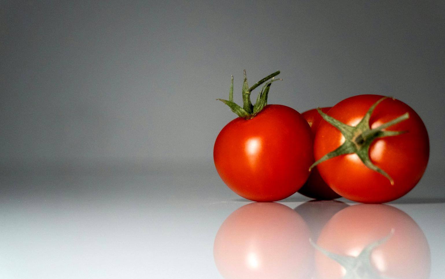Workshop participant preparing fresh ingredients during hands-on cooking session