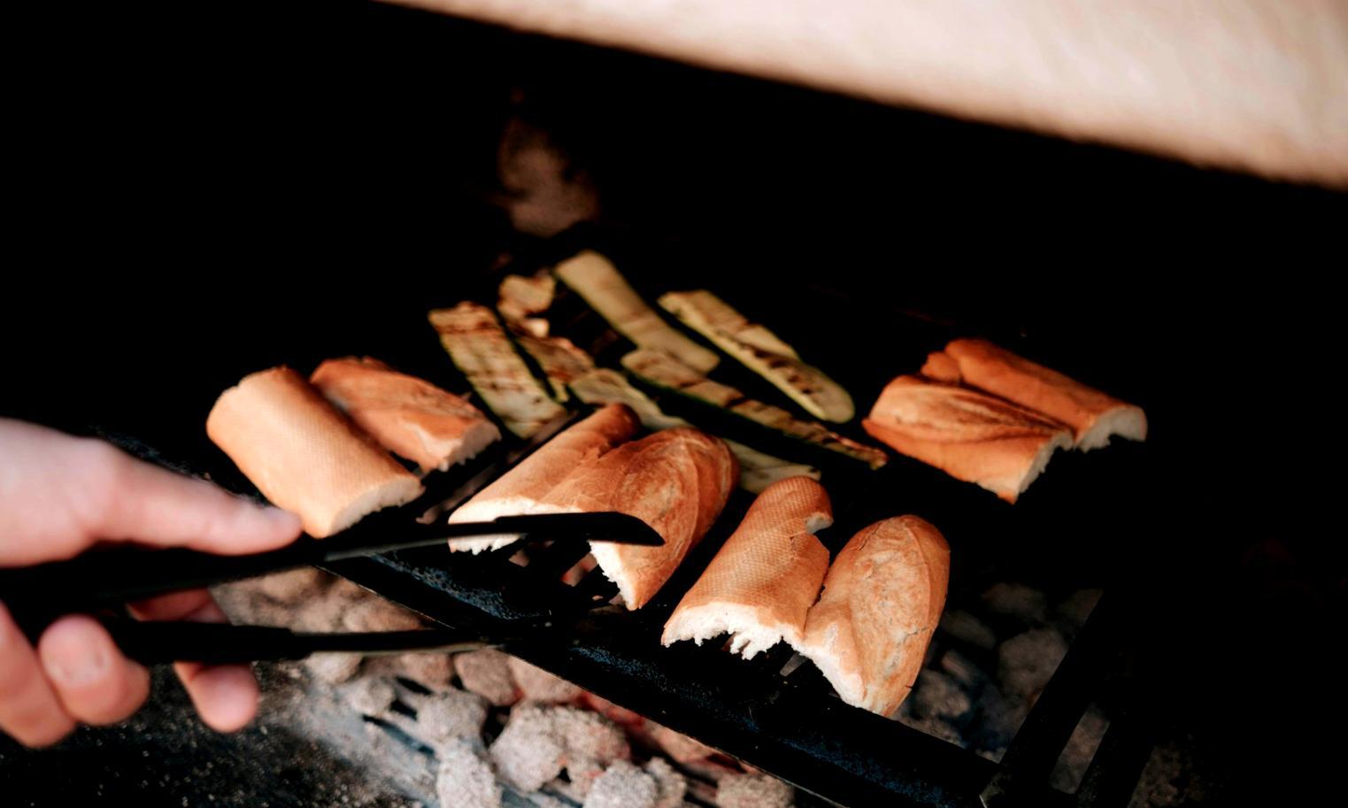 Fresh ingredients arranged on a rustic wooden kitchen counter